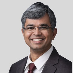 Dr Anup Warrier